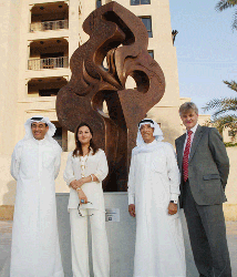 (L-R): Mr Mohamed Alabbar, Chairman of Emaar Properties; Ms Samia Saleh, owner of the Courtyard Gallery; Kuwaiti sculptor Mr Sami Mohamed Al Saleh; and HE Edward Oakden CMG, British Ambassador to the United Arab Emirates, at the unveiling of Al Sidra in Downtown Burj Dubai. 
