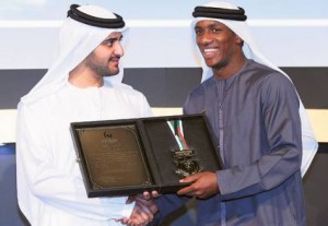     *  Shaikh Maktoum Bin Mohammad presents an award to Ahmad Khalil, member of the UAE football team, at the Shaikh Mohammad Bin Rashid Al Maktoum Creative Sports Award 2011 ceremony.     * Image Credit: Oliver Clarke/Gulf News
