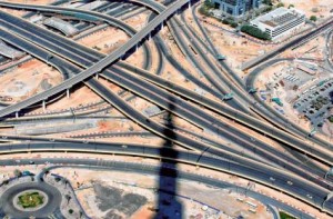     *  Image Credit: Megan Hirons Mahon/Gulf News archive     * Burj Khalifa's shadow cuts across Shaikh Zayed Road’s first interchange. The regional turmoil has enhanced the investment appeal of Dubai and most key sectors of the economy except real estate have made a steady recovery.