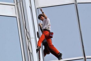   Alain "Spider-man" Robert climbs up Dubai's iconic Burj Khalifa, the world's tallest tower, in March last year. The Frenchman's daring ascent took six hours.  AP